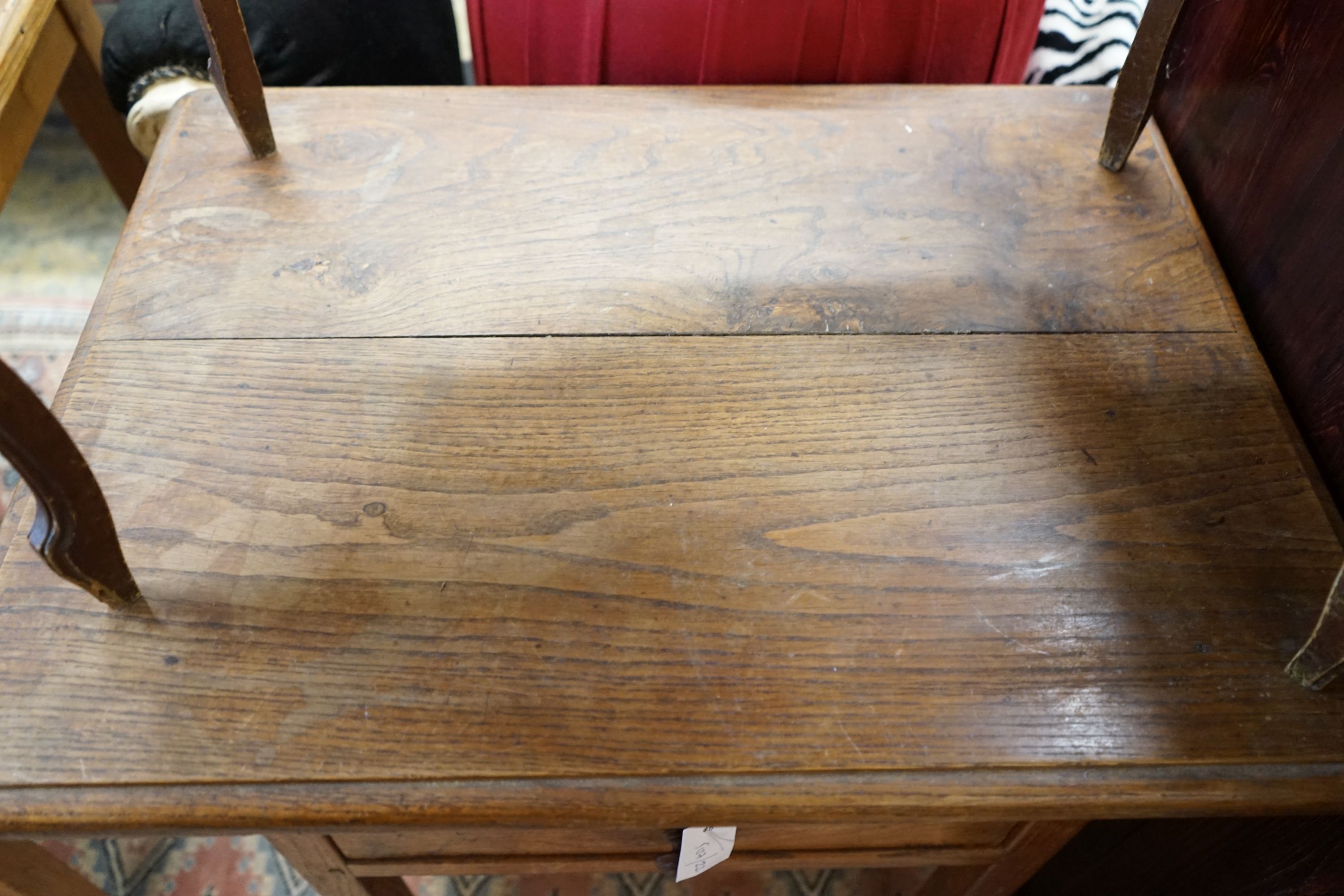 A 19th century provincial oak two drawer side table, width 67cm, depth 50cm, height 72cm